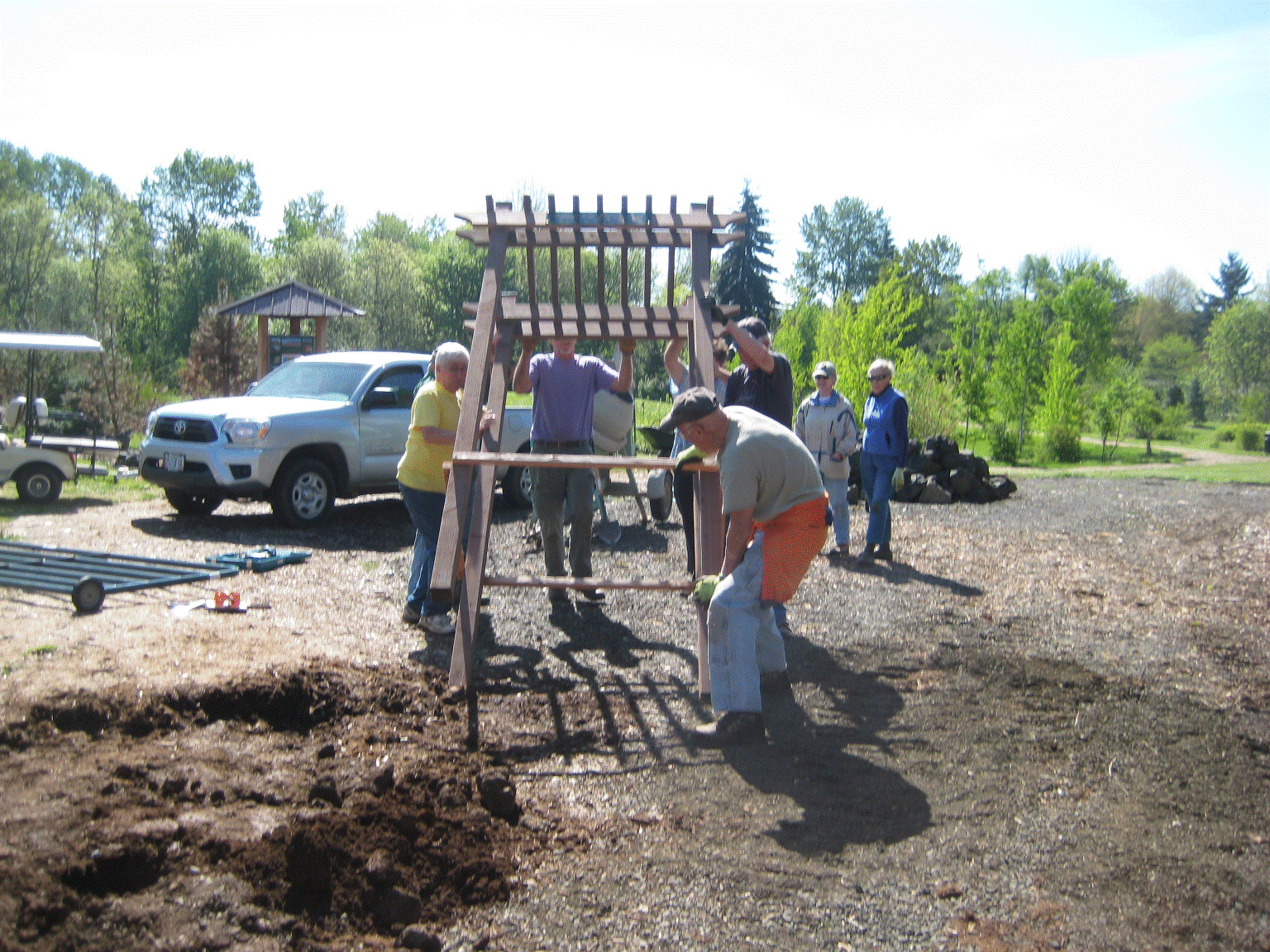 Installing one of may kiosk in the arboretum